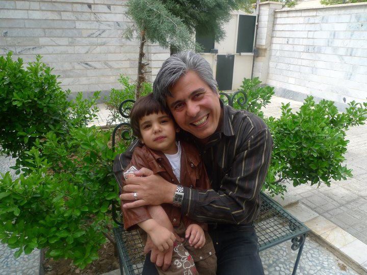 Pastor Behnam Irani with his son.