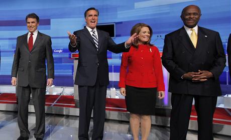 U.S. Rep. Paul, Texas Governor Perry, former Massachusetts Governor Romney, U.S. Rep. Bachmann and businessman Cain pose in Orlando