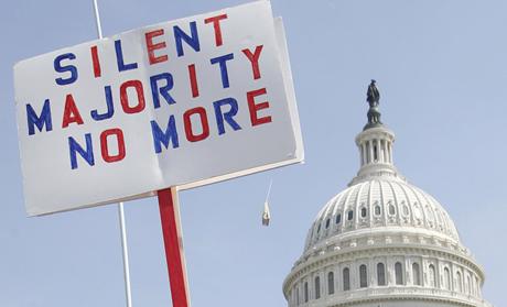 Opponents of the proposed U.S. health care bill are pictured during a rally outside the U.S. Capitol Building in Washington