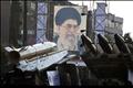 Iranian-made Fateh 110 and Persian Gulf missiles are seen next to portrait of Iran's Supreme Leader Ayatollah Khamenei at Baharestan square in southern Tehran