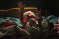 A baby gestures minutes after he was born inside the pediatric unit at hospital Escuela in Tegucigalpa