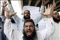 Supporters of Pakistani Islamist party celebrate President Pervez Musharraf's resignation in Multan