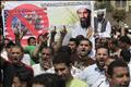 Islamists hold a picture of Osama bin Laden during a protest in Cairo
