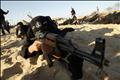 A Palestinian militant from Al-Ansar brigade takes part in a training session in Khan Younis in the southern Gaza Strip