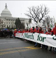 Demonstrators hold a banner during the "March for Life" as they pass the U.S. Capitol in Washington 