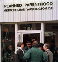 A GUARD TURNS AWAY THE PRESS AT PLANNED PARENTHOOD IN D.C.