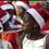 A girl plays with a noise maker while children wait for a presidential speech during a children's Christmas gathering at the national palace in Port-au-Prince